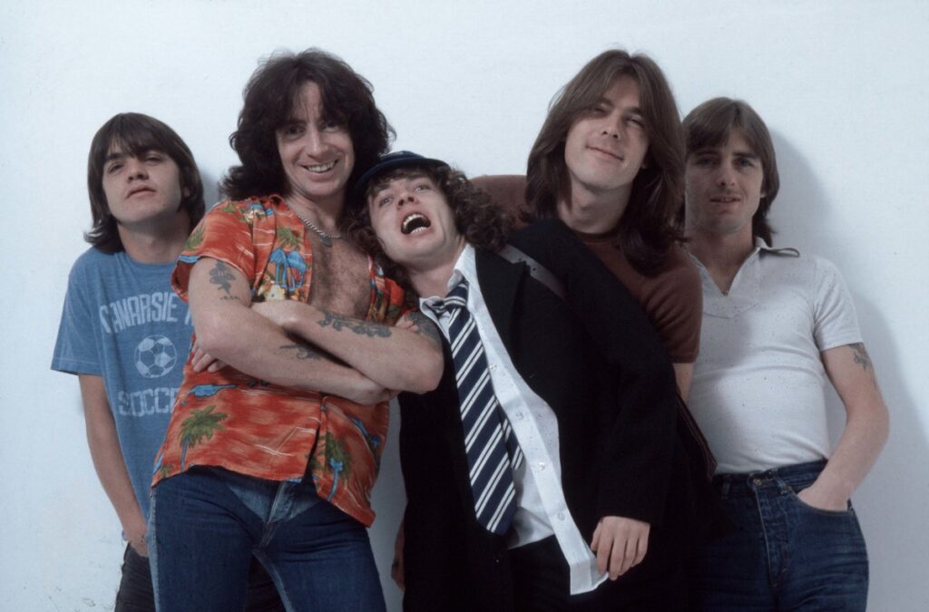 AC/DC Members Malcolm Young, Bon Scott, Angus Young, Cliff Williams, Phil Rudd studio group shot