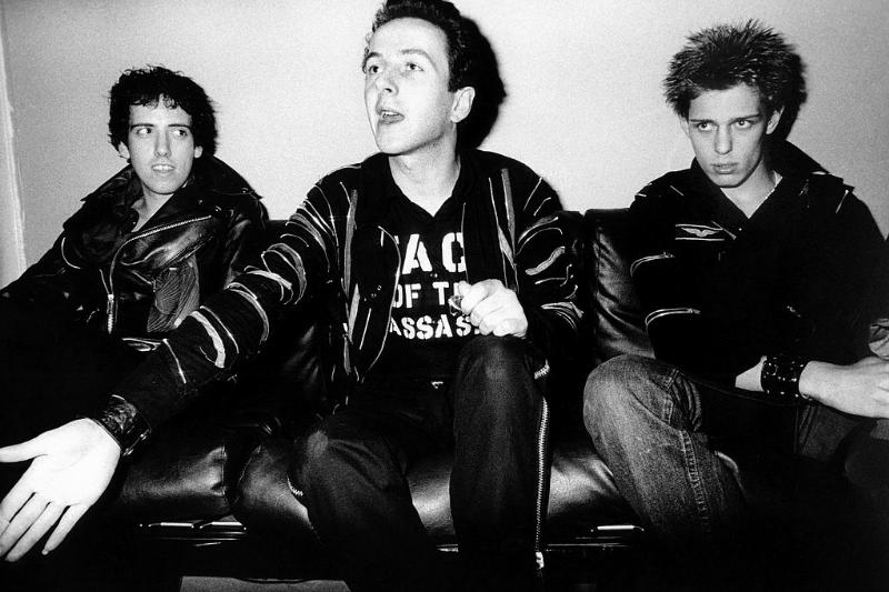 The Clash sitting on a couch -85237426