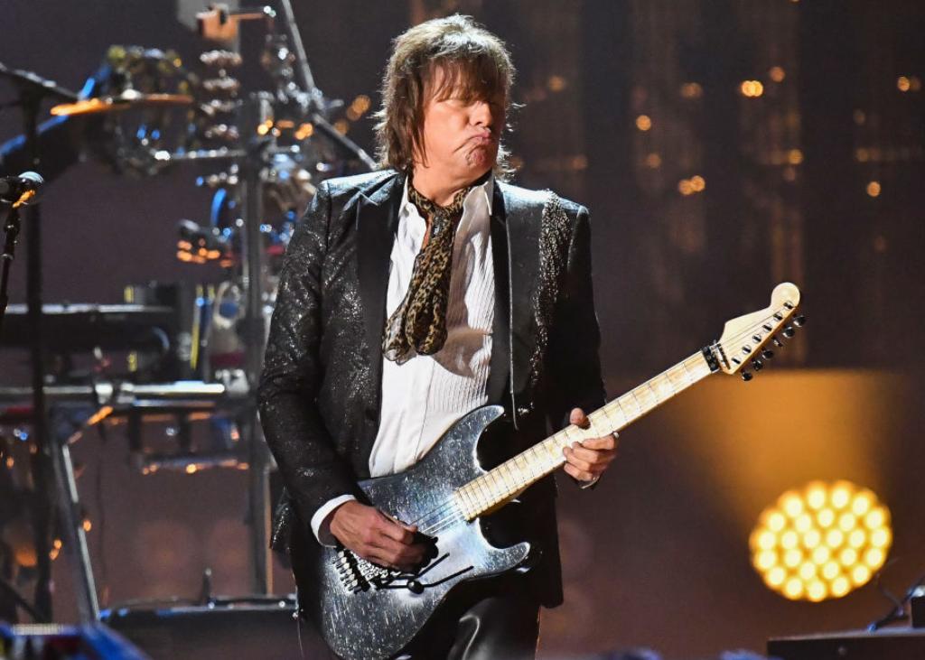 Now, Richie Sambora Is Trying To Rock His Guitar And A Mullet