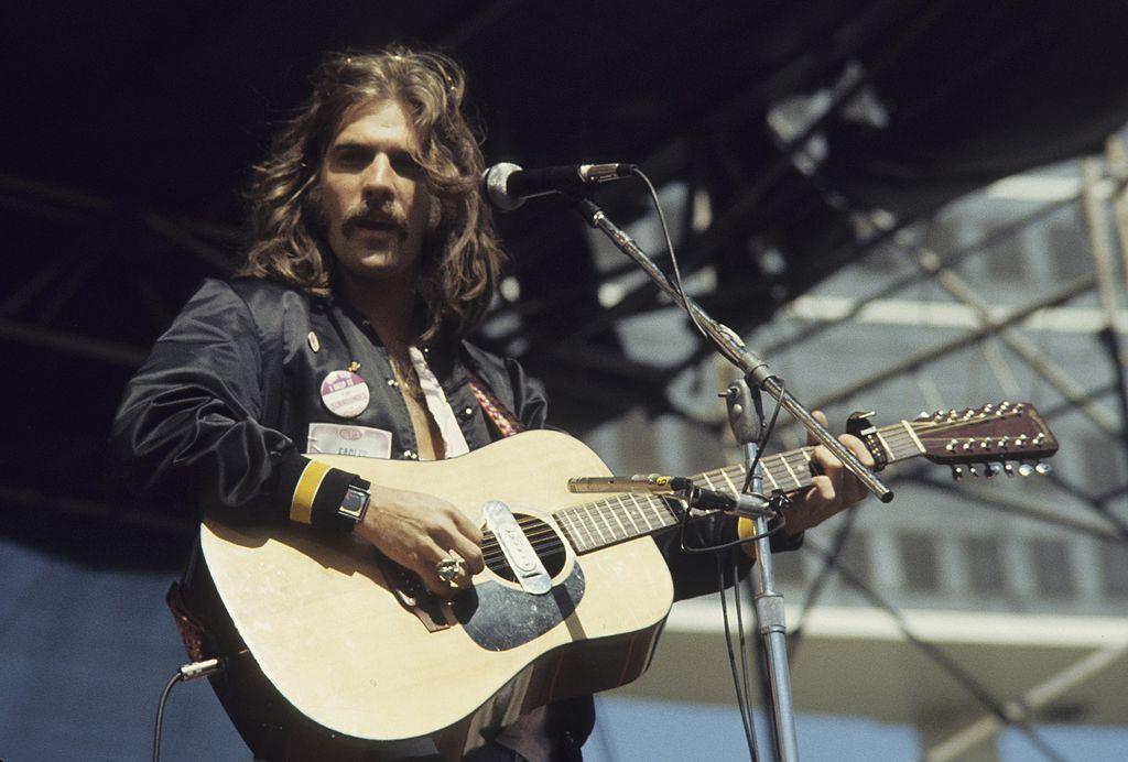 Glenn Frey with acoustic guitar