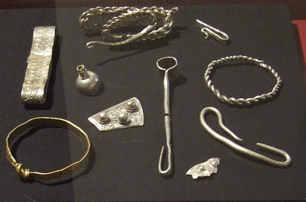 Silver and gold armrings, neckrings and a brooch from the Vale of York hoard