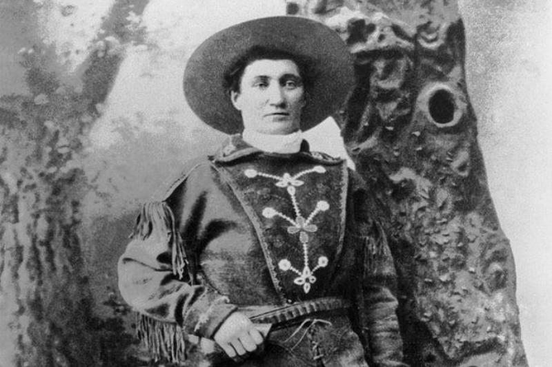 Jane poses in a cowboy outfit.