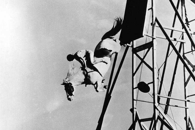 Sonora leaps off a tower horseback.