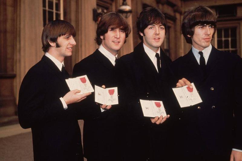 Beatles with MBE medals
