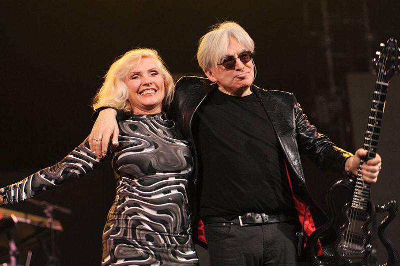 Debbie and Chris pose together onstage.