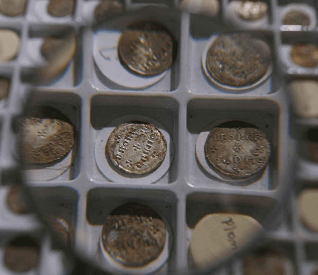 Some of the 600 coins of a find of Viking treasure dating back to the ninth century, discovered from the Harrogate area in January, are shown at the British Museum in London today.