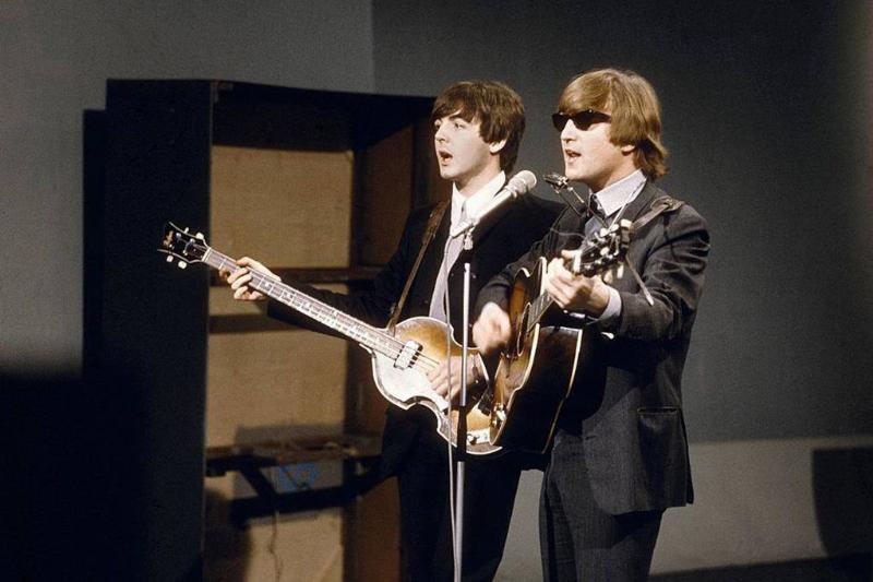 Lennon playing with McCartney