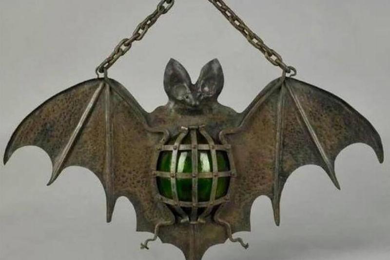 Cast iron in the shape of a bat