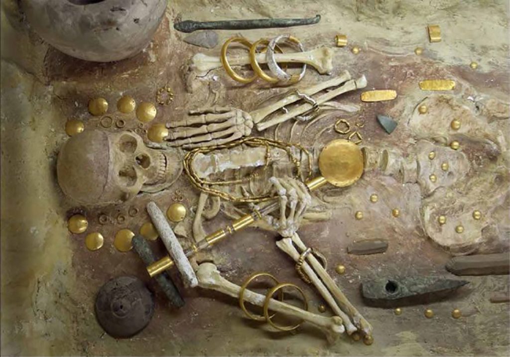 Skeleton with gold