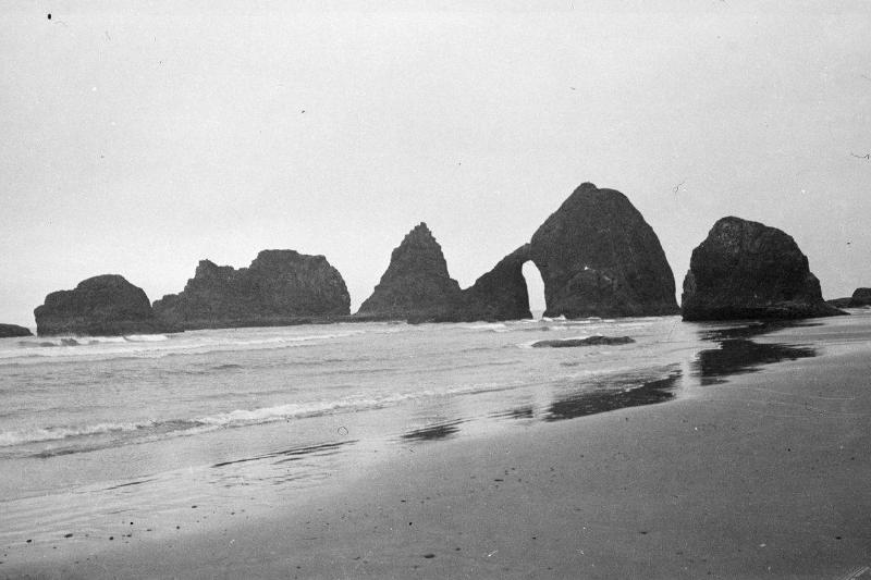 Rock formations are seen on a beach in this 1938 photograph.