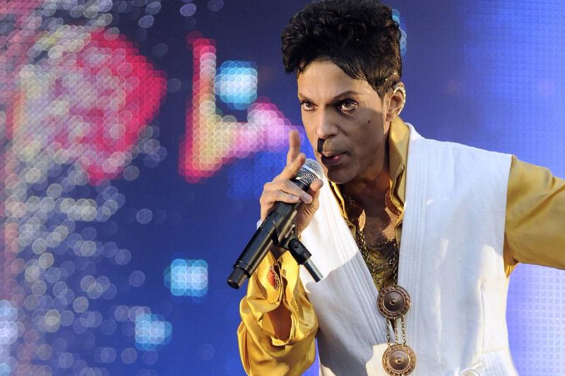 US singer and musician Prince (born Prince Rogers Nelson) performs on stage.