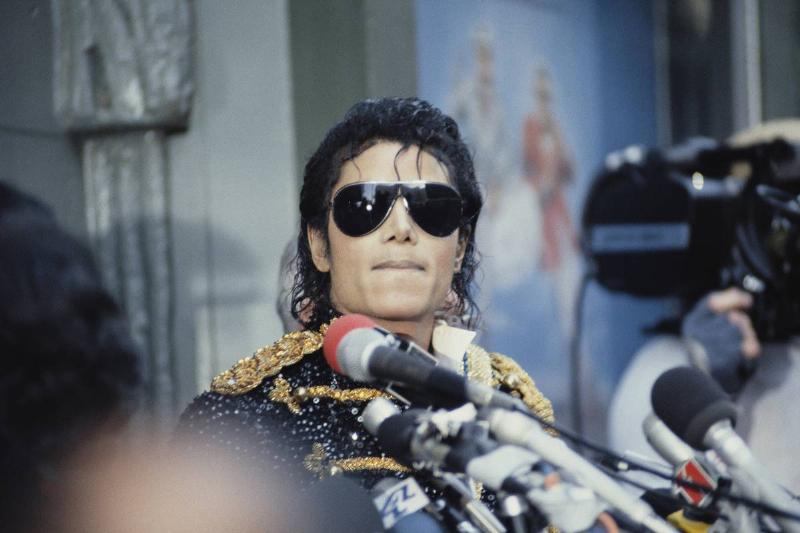 Michael Jackson gets interviewed while receiving his Hollywood star.