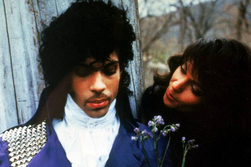 Prince and Apollonia Kotero act in the movie Purple Rain.